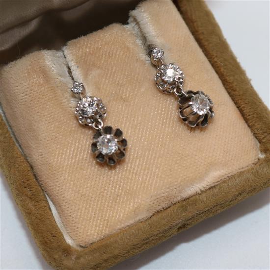 Pair of early 20th century white gold and diamond drop earrings, drop 17mm(-)
